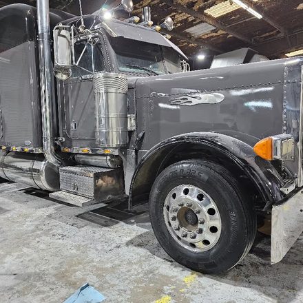 Peterbilt tractor unit parked inside the Dallas shop bay
