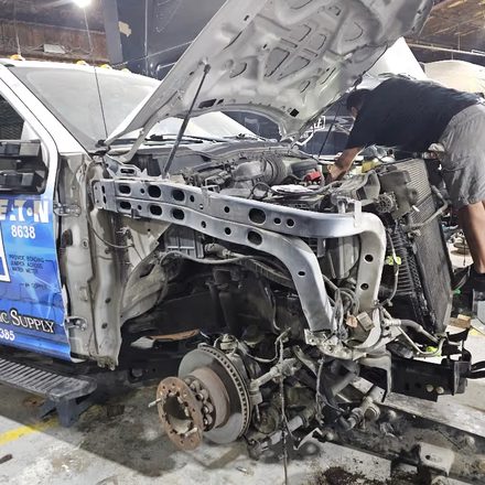 Front end stripped back so damage behind the bumper is visible