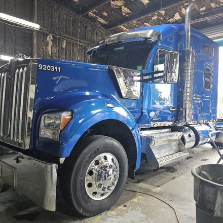 Blue Kenworth cab finished and glossed inside the shop